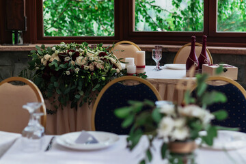 Decorations on the wedding table in a rustic style.
