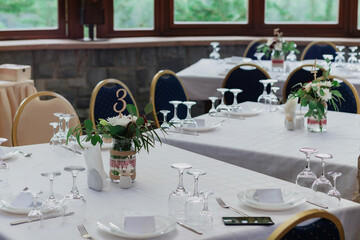 Decorations on the wedding table in a rustic style.