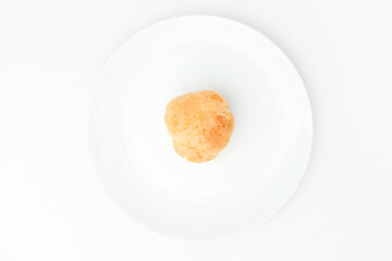 Cream puff on white background