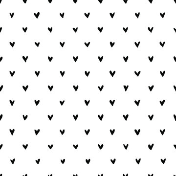 Hand drawn heart seamless pattern. Doodle hipster simple background about love for Valentines day. Trendy simple texture with tiny little hearts. Perfect for wrapping, fabric, wallpaper.