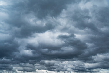 Dark storm clouds before the rain at day time.