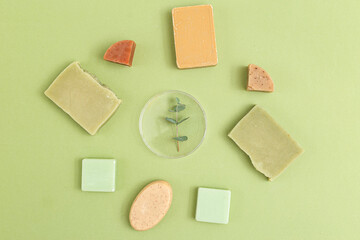 Natural  soap and  eucalyptus on a green background. Organic. Minimalism