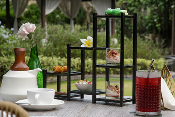 Traditional afternoon tea setup in the garden