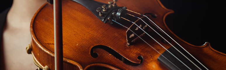 close up of professional violin and bow, panoramic concept