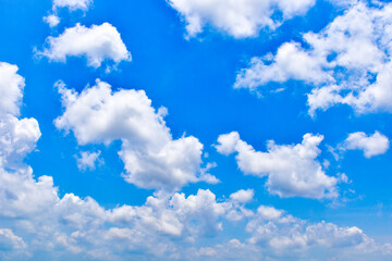 The white cloud cumulus in the blue sky background.