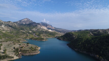 Fototapeta na wymiar Gecitkoy (Dagdere) dam with turquoise water near Kyrenia, Northern Cyprus.