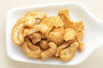 Savoury flavoured cashew nuts in a heap