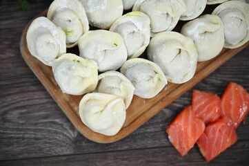 Dumplings manual molding. Rustic food. Selective focus.