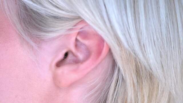 Closeup on ear of young woman