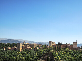 Fototapeta na wymiar The Alhambra in Granada with Sierra Nevada in the background. Andalusia. Spain