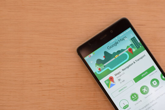 BEKASI, WEST JAVA, INDONESIA. JUNI 1, 2020 : Maps - Navigation & Transport dev app with magnifying on Smartphone screen. Maps is a freeware web browser developed by Google LLC