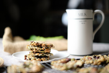 Mixed Nut and Dried fruits and Seeds Florentine, Gluten free whole foods Healthy biscuit cookies. set on cafe table.