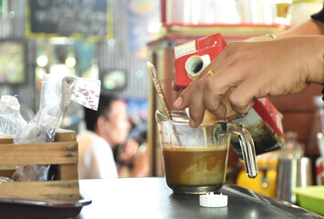 Barista cafe making coffee for the customer. Preparation Service Concept.