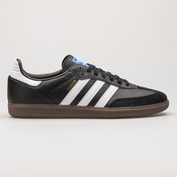 VIENNA, AUSTRIA - MAY 27, 2018: Adidas Samba OG black and white sneaker on white background.