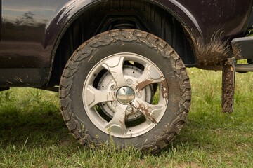 Wheel of a 4x4 vehicle with mud