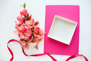 romantic composition. open empty gift box and a bouquet of spring flowers. space for text