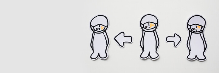 Paper icons of human stand at a distance from each other