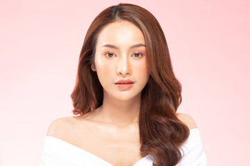 Fototapeta premium Beautiful Asian woman wearing bathrobe smile with clean and fresh skin Happiness and cheerful with positive emotional,isolated on white background,Beauty Cosmetics and spa Treatment Concept