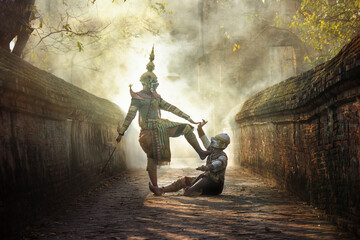 Fototapeta premium KHON THAI, the giant fighting with Hanuman or the white monkey, the character of Ramayana in Thai literature.Smoke background blur.