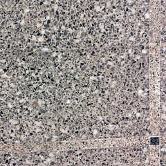 Grey granite stone background close up ornamental part