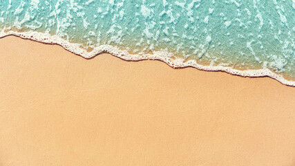 Soft wave lapped on empty sandy beach, Summer Background. copy space.