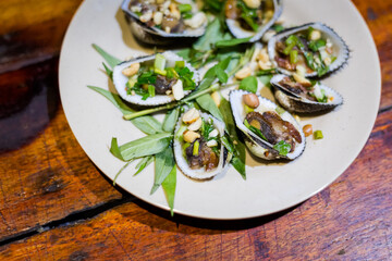 Delicious vietnamese mussels in a restaurant
