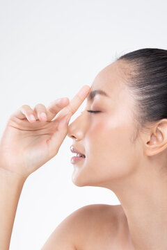 Beauty Asian woman touch eyebrow smile skin spa facial treatment