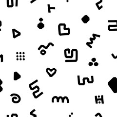 A variety of abstract black symbols are randomly scattered on a white background. Seamless pattern with small geometric black and white patterns. For the site, social networks, books, notebook covers