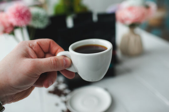 delicious aromatic coffee, in a cup, beans, natural, ground