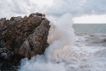 Fototapeta na wymiar View of Sea shore and stones. Waves hitting the sea shore. Nature background