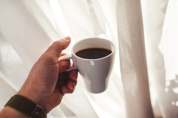 delicious aromatic coffee, in a cup, beans, natural, ground