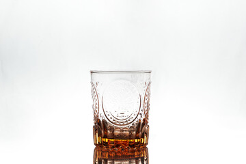 Empty glass on white background. Isolated. Backlight.
