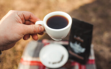 delicious aromatic coffee, in a cup, beans, natural, ground