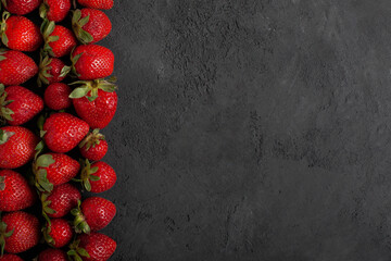Fresh Strawberry On Dark Concrete Background With Copy Space.