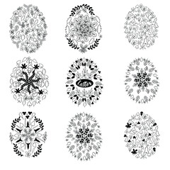 Set of Easter eggs decorated with leaves on a white background. Vector illustration.Logo template for holiday design and invitations.