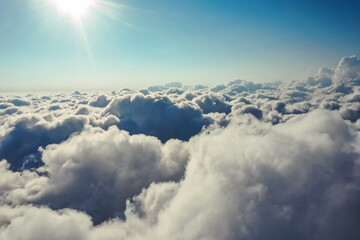 Clouds top view. Heavenly landscape. Over the Clouds. Fantastic background with clouds