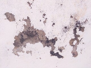 Abstract background of concrete & cement plaster painted wall or distressed yellow brown old brick floor of industrial construction building with stain peeling surface, dirty house exterior concept  