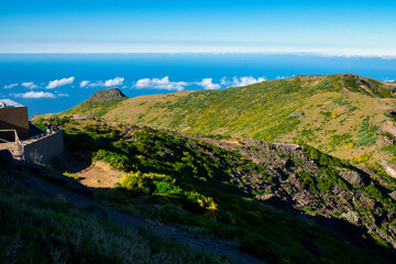 Fototapeta na wymiar Gorgeous mountain landscape view of highest Madeira mountain and clouds on dawn