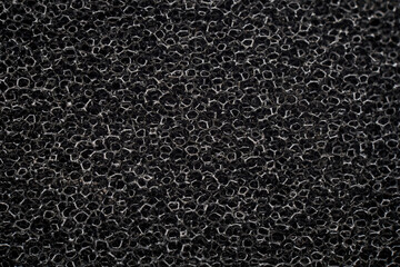 banner of macro black polyurethane foam rubber washcloth sponge