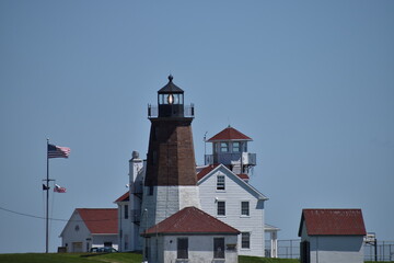 close up of lighthouse with light on