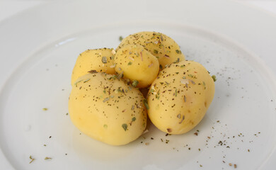 Boiled peeled potatoes on white