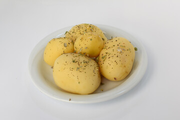 Boiled peeled potatoes on white