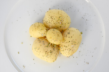 Boiled peeled potatoes on white
