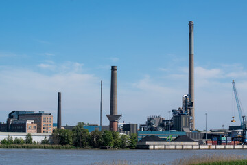 Heavy industry in the port of Antwerp in the rive Scheldt. Belgium