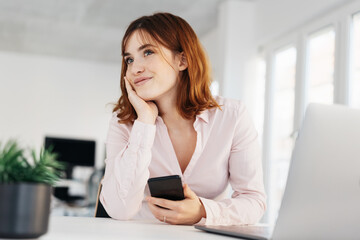 Young businesswoman looking off to the side