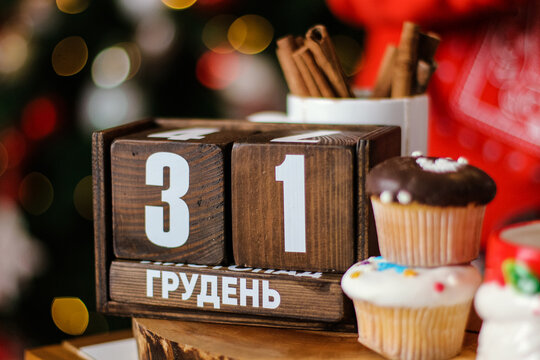Wooden 31 December calendar. New year at work concept. Winter time.