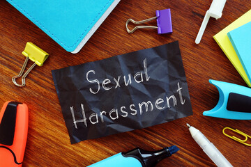 Sexual Harassment is shown on the conceptual business photo
