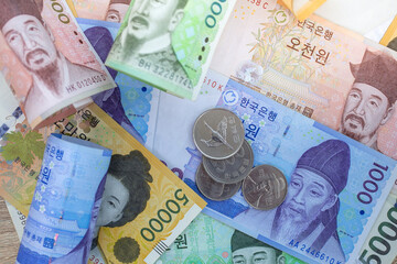 Korean currency banknotes and coins. Korean currency exchange rate