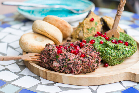 Georgian traditional food Pkhali, meal and dish with vegetables and pomegranates.