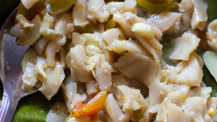 processed mushroom wrapped in banana leaves